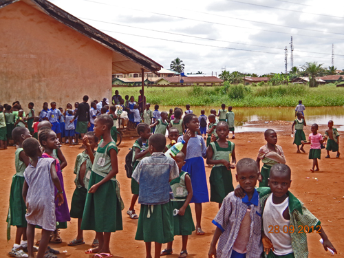 What is left of the school compound the children have to use for recreation and urination, etc